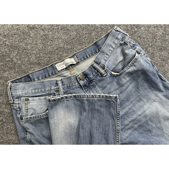 Levi's 569 Jeans Mens 34x34 (33x31) Blue Loose Straight Medium Wash Faded Grunge - Picture 1 of 9